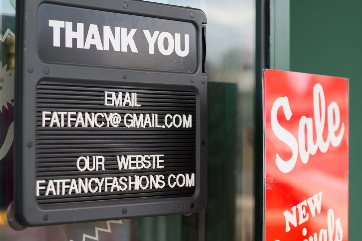 A thank you sign showing a email address and web address for a small business branding session in the PNW