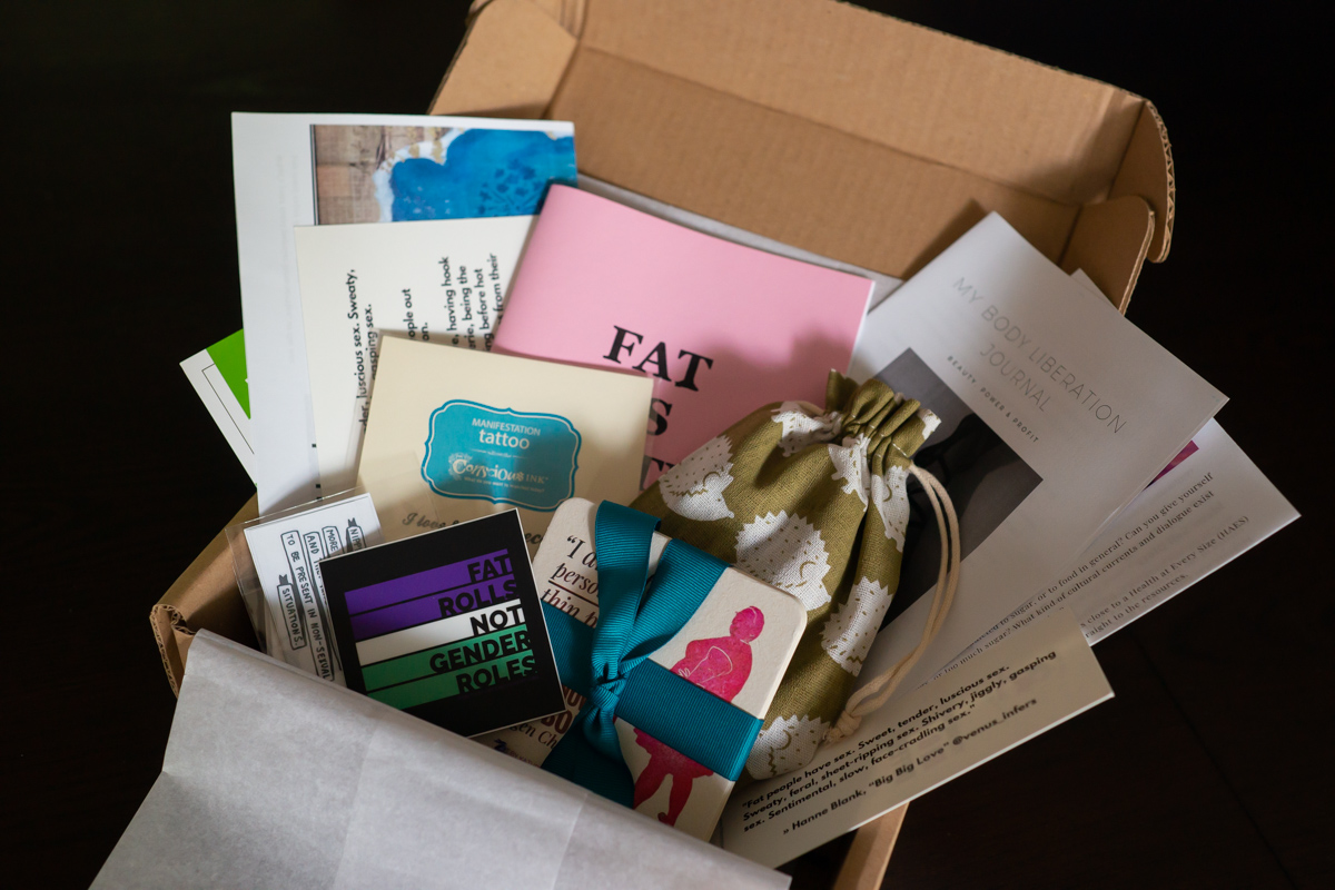 A box of fat positive goodies during a small business photo session in WA