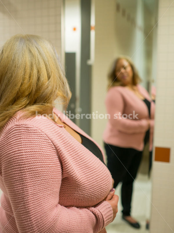 Body Image Stock Photo: Plus Size Woman in Office Bathroom Mirror - Body Liberation Photos