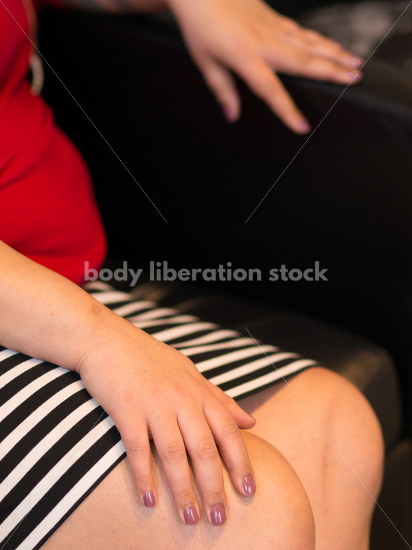 Business Stock Image: Plus Size Black Woman Sitting in Office Building Lobby - Body Liberation Photos