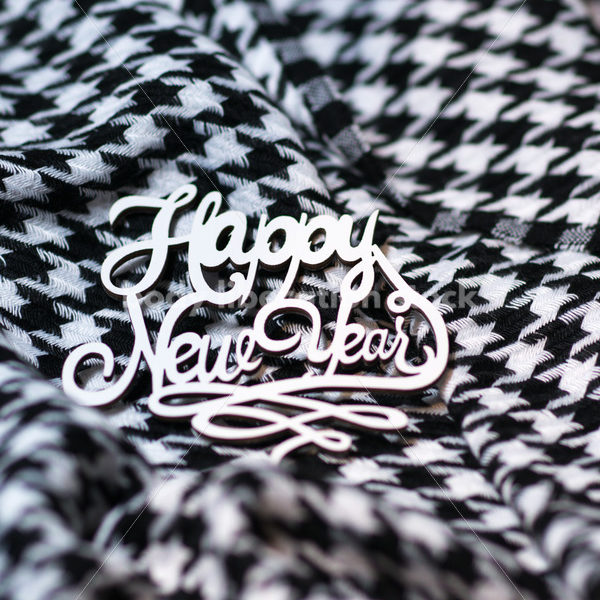 Christmas Stock Photo: Happy New Year on Houndstooth Scarf - Body Liberation Photos