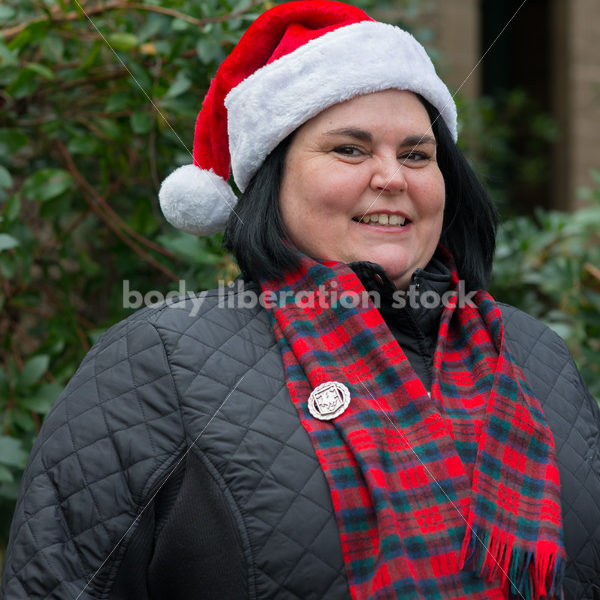 Christmas Stock Photo: Plus Size Teacher in Santa Hat - Body Liberation Photos