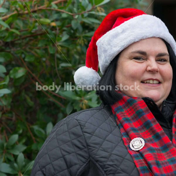 Christmas Stock Photo: Plus Size Teacher in Santa Hat - Body Liberation Photos