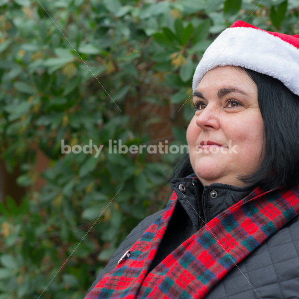 Christmas Stock Photo: Plus Size Teacher in Santa Hat - Body Liberation Photos