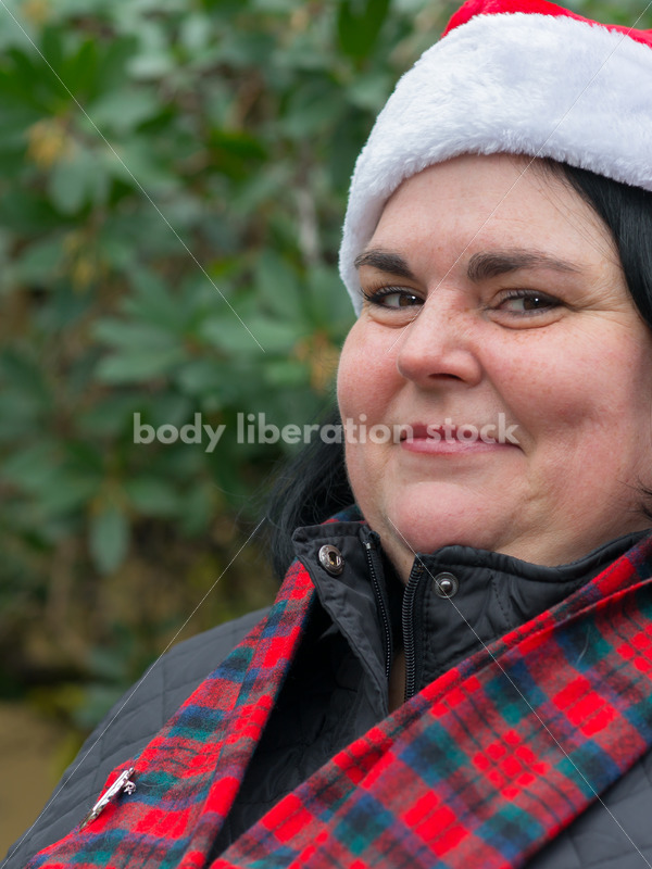 Christmas Stock Photo: Plus Size Teacher in Santa Hat - Body Liberation Photos