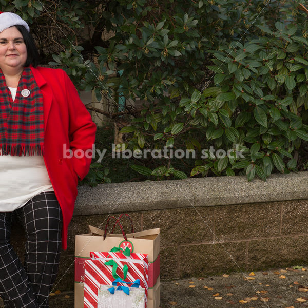 Christmas Stock Photo: Plus Size Teacher in Santa Hat - Body Liberation Photos