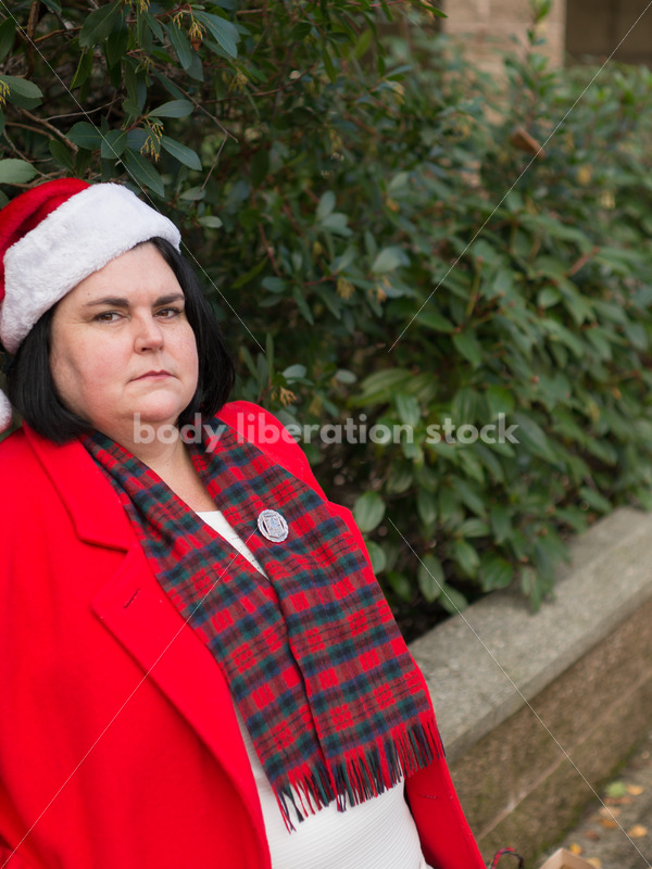 Christmas Stock Photo: Plus Size Teacher in Santa Hat - Body Liberation Photos
