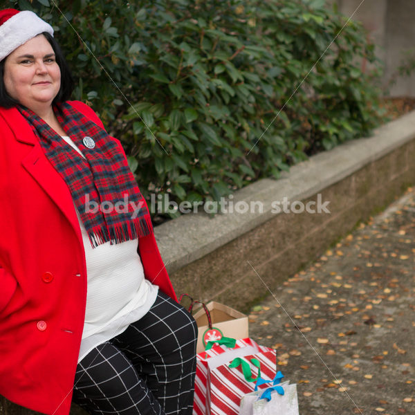 Christmas Stock Photo: Plus Size Teacher in Santa Hat - Body Liberation Photos