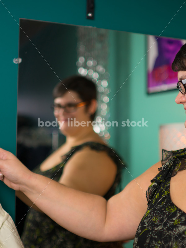Clothing Retail Stock Photo: Plus Size Person Tries on Clothes in Dressing Room - It's time you were seen ⟡ Body Liberation Photos