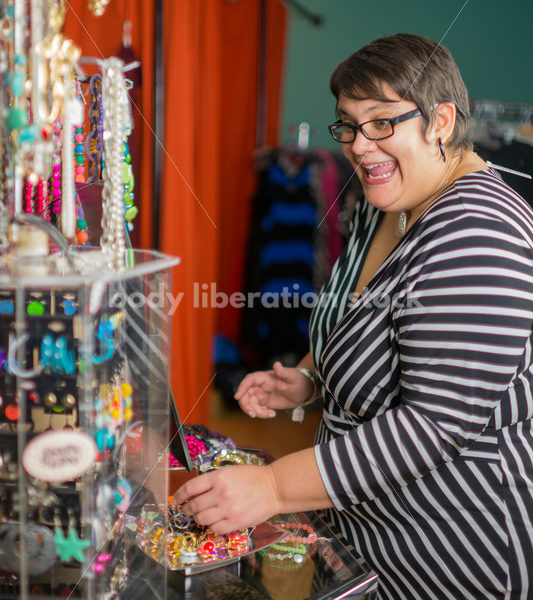 Clothing Retail Stock Photo: Plus Size Woman Shops for Accessories - Body Liberation Photos