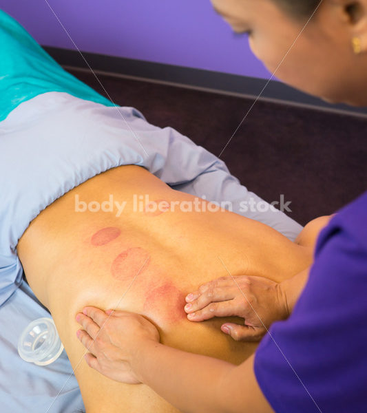 Diverse Massage Therapy Stock Image: Filipino Woman Massages Hispanic Man - Body Liberation Photos