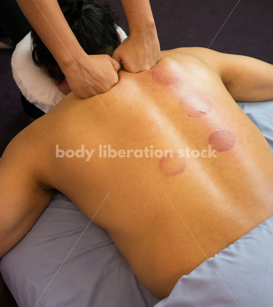 Diverse Massage Therapy Stock Image: Filipino Woman Massages Hispanic Man - Body Liberation Photos