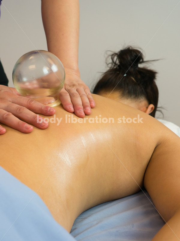 Diverse Massage Therapy Stock Image: Filipino Woman Performs Massage Cupping - Body Liberation Photos