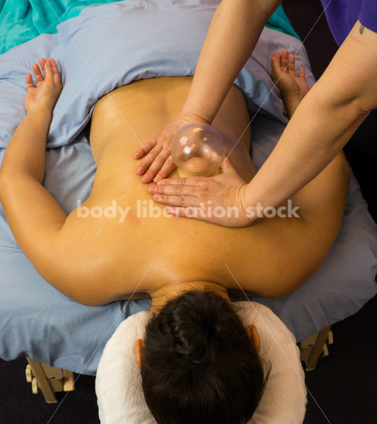 Diverse Massage Therapy Stock Image: Filipino Woman Performs Massage Cupping - Body Liberation Photos