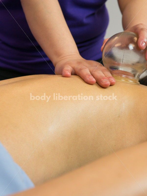 Diverse Massage Therapy Stock Image: Filipino Woman Performs Massage Cupping - Body Liberation Photos