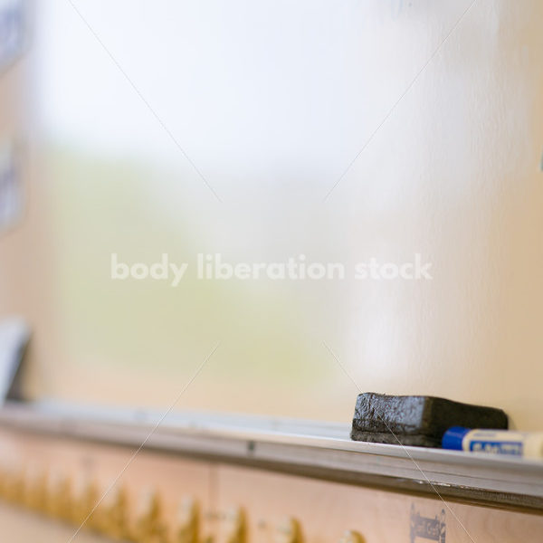 Education Stock Image: Classroom Coat Hooks and Whiteboard - Body Liberation Photos