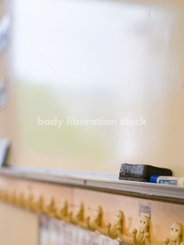 Education Stock Image: Classroom Coat Hooks and Whiteboard - Body Liberation Photos