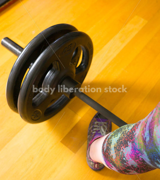 HAES Stock Photo: Female Weightlifter with Pink Hair Lifts Heavy Weight in Gym - Body Liberation Photos