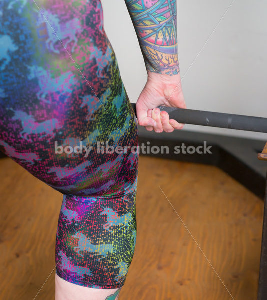 HAES Stock Photo: Female Weightlifter with Pink Hair Lifts Heavy Weight in Gym - Body Liberation Photos