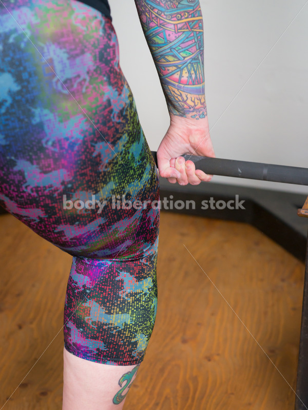HAES Stock Photo: Female Weightlifter with Pink Hair Lifts Heavy Weight in Gym - Body Liberation Photos