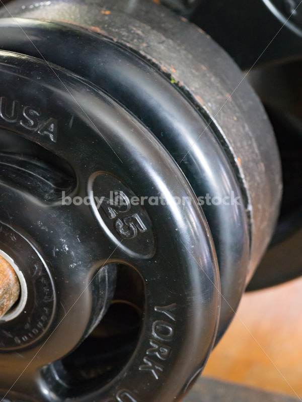 HAES Stock Photo: Weight Plates on Gym Rack - Body Liberation Photos