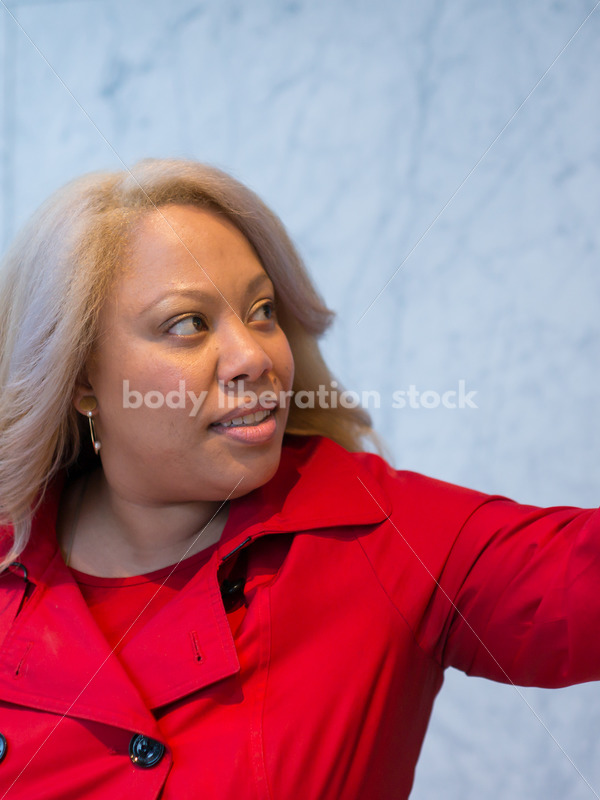 Human Rights & LGBT Stock Photo: African American Lesbian Woman Raising Fist for Protest - Body Liberation Photos