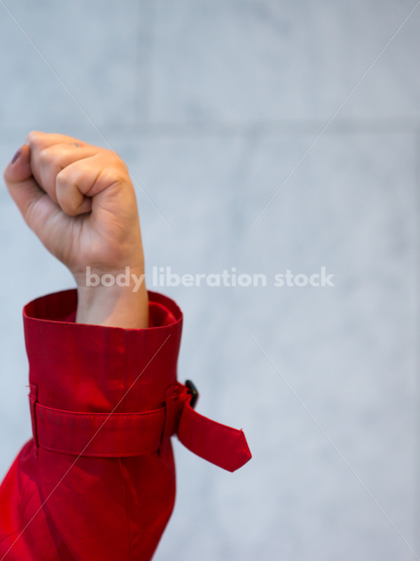 Human Rights & LGBT Stock Photo: African American Lesbian Woman Raising Fist for Protest - Body Liberation Photos