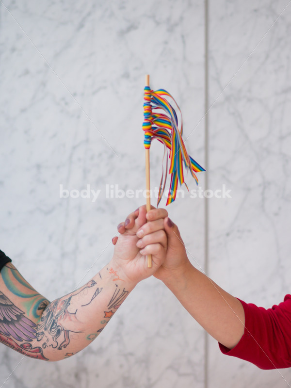 Human Rights & LGBT Stock Photo: Lesbian Couple with Rainbow Ribbon Flag - Body Liberation Photos