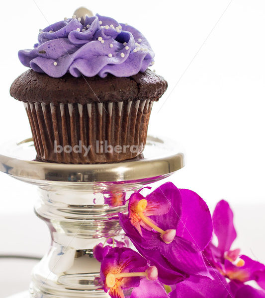 Intuitive Eating Stock Photo: Cupcake on Silver Pedestal - Body Liberation Photos