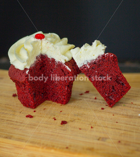 Intuitive Eating Stock Photo: Cupcake on Wooden Cutting Board - Body Liberation Photos