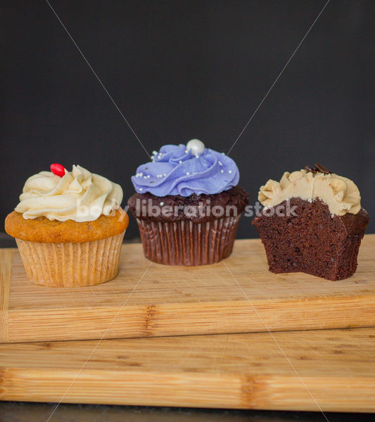 Intuitive Eating Stock Photo: Cupcakes on Wooden Cutting Board - Body Liberation Photos