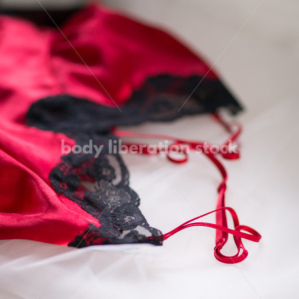 Plus Size Lingerie Stock Image: Red Babydoll on White - Body Liberation Photos