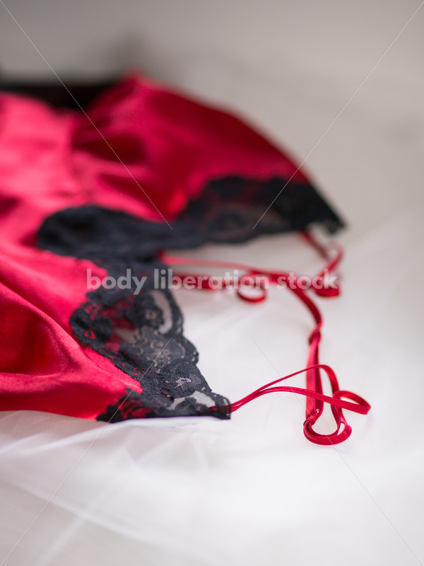 Plus Size Lingerie Stock Image: Red Babydoll on White - Body Liberation Photos