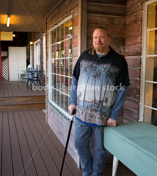 Plus Size Stock Photo: Man in 50s with Rustic Wood Walls - Body Liberation Photos