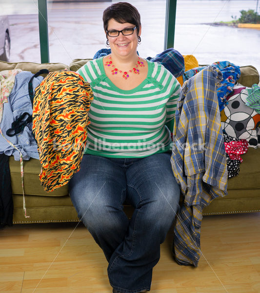 Retail Stock Photo: Plus Size Woman Shops for Clothing - Body Liberation Photos