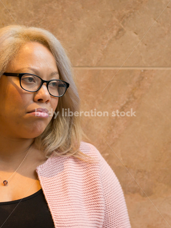 Royalty-Free Stock Image: Black LGBT Woman with Stressed, Sad, Anxious or Depressed Expression - Body Liberation Photos