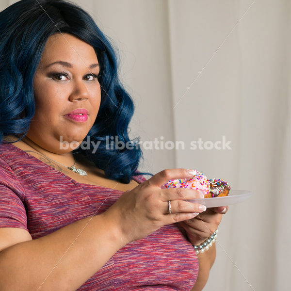 Royalty Free Stock Photo: African American Woman with Glazed Donuts - Body Liberation Photos