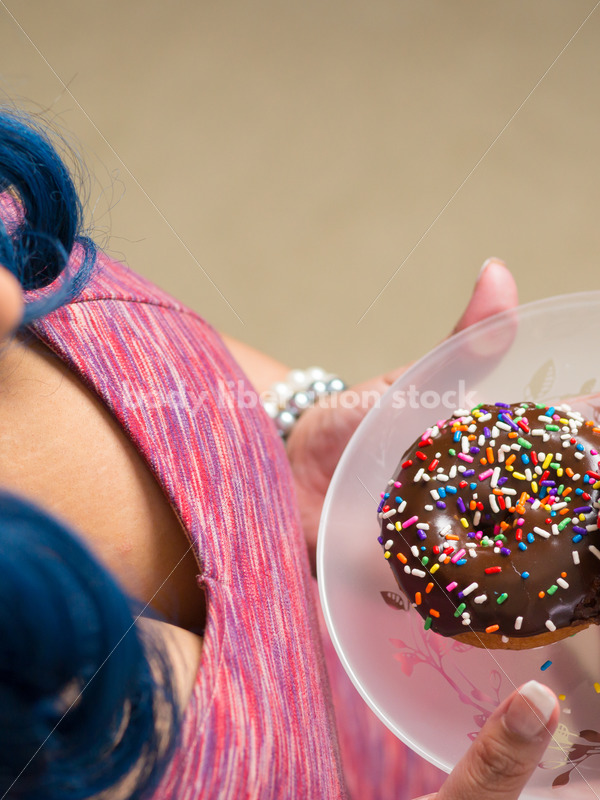 Royalty Free Stock Photo: Black Woman with Glazed Donuts - Body Liberation Photos