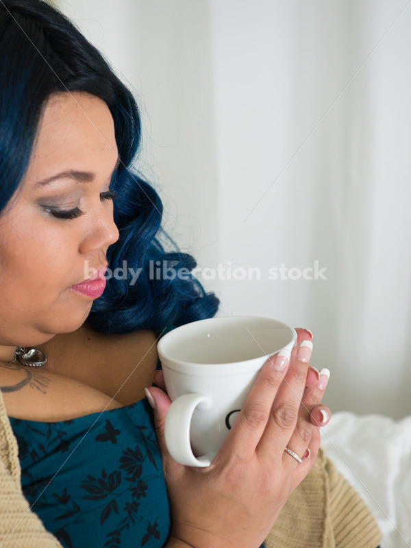 Royalty Free Stock Photo: Plus Size African American Woman Drinks Coffee on Bed - Body Liberation Photos