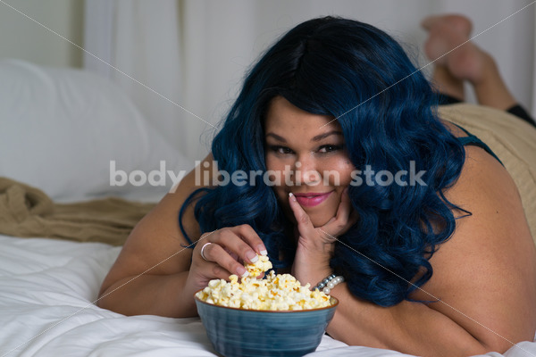 Royalty Free Stock Photo: Plus Size African American Woman Reading on Bed -  It's time you were seen ⟡ Body Liberation Photos