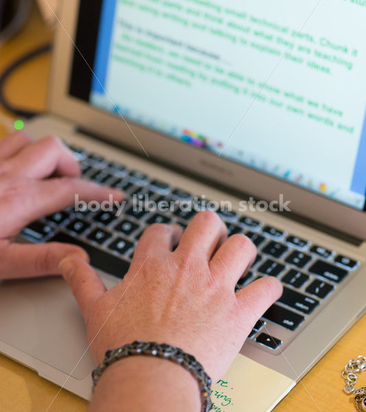 Royalty Free Stock Photo: Plus Size Elementary School Teacher Using Computer - Body Liberation Photos