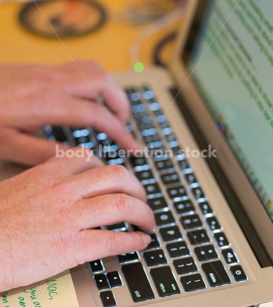 Royalty Free Stock Photo: Plus Size Elementary School Teacher Using Computer - Body Liberation Photos