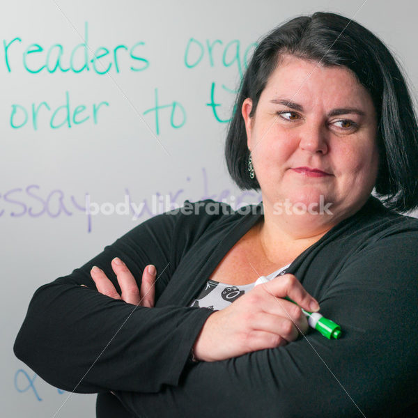 Royalty Free Stock Photo: Plus Size Teacher with Whiteboard - Body Liberation Photos