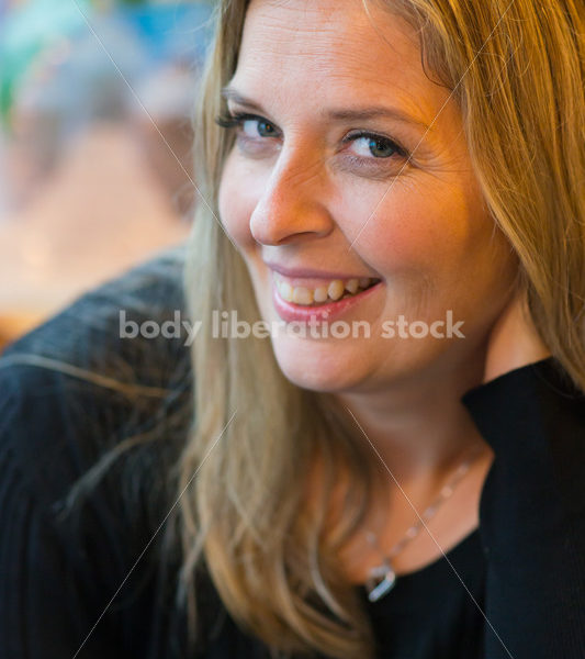 Royalty Free Stock Photo: Plus Size Woman Close-up in Coffee Shop - Body Liberation Photos