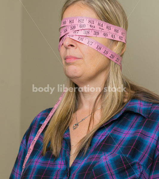 Royalty Free Stock Photo for Dieting Recovery: Woman Blinded by Tape Measure - Body Liberation Photos