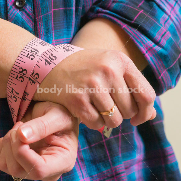 Royalty Free Stock Photo for Dieting Recovery: Woman Blinded by Tape Measure - Body Liberation Photos