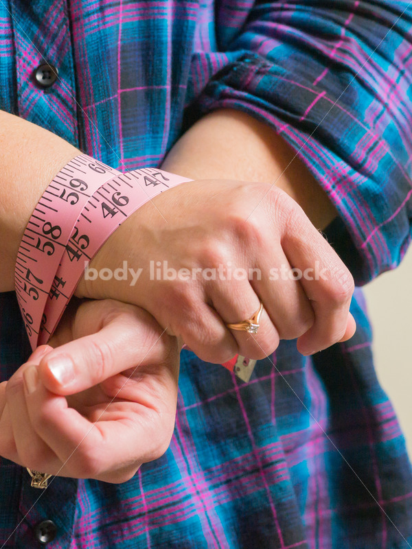 Royalty Free Stock Photo for Dieting Recovery: Woman Blinded by Tape Measure - Body Liberation Photos