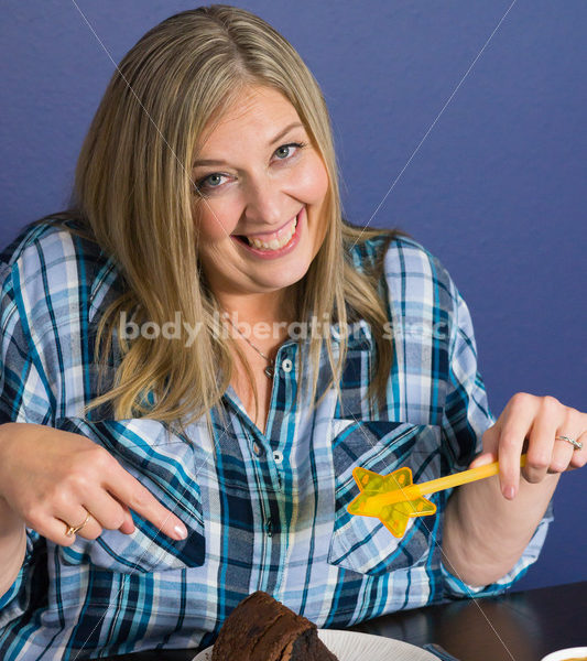 Royalty Free Stock Photo for Intuitive Eating: Plus Size Woman Chooses from Variety of Foods on Dining Table - Body Liberation Photos