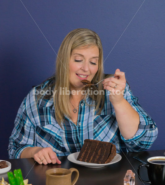 Royalty Free Stock Photo for Intuitive Eating: Plus Size Woman Eats Chocolate Cake, Nothing Bad Happens - Body Liberation Photos