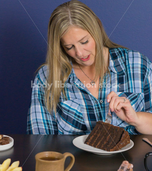 Royalty Free Stock Photo for Intuitive Eating: Plus Size Woman Eats Chocolate Cake, Nothing Bad Happens - Body Liberation Photos